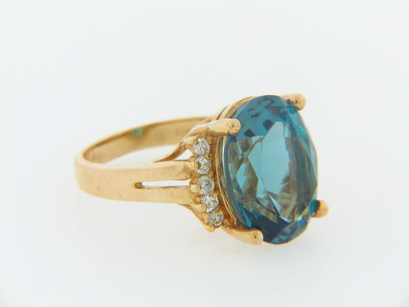 14K-YG BLUE TOPAZ AND DIAMOND RING