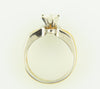 Platinum and 18K Yellow Gold, Diamond Solitaire Ring