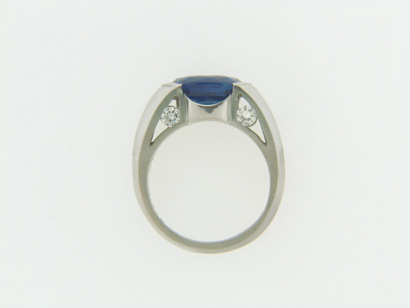 PLATINUM AND 18K YELLOW GOLD SAPPHIRE AND DIAMOND RING